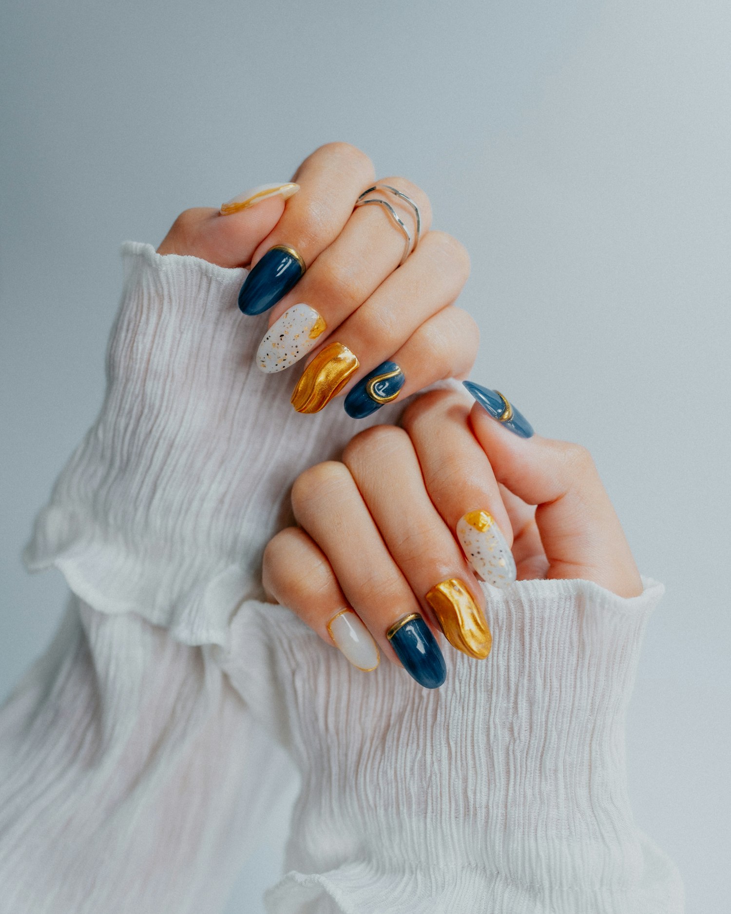 Blue manicured nails