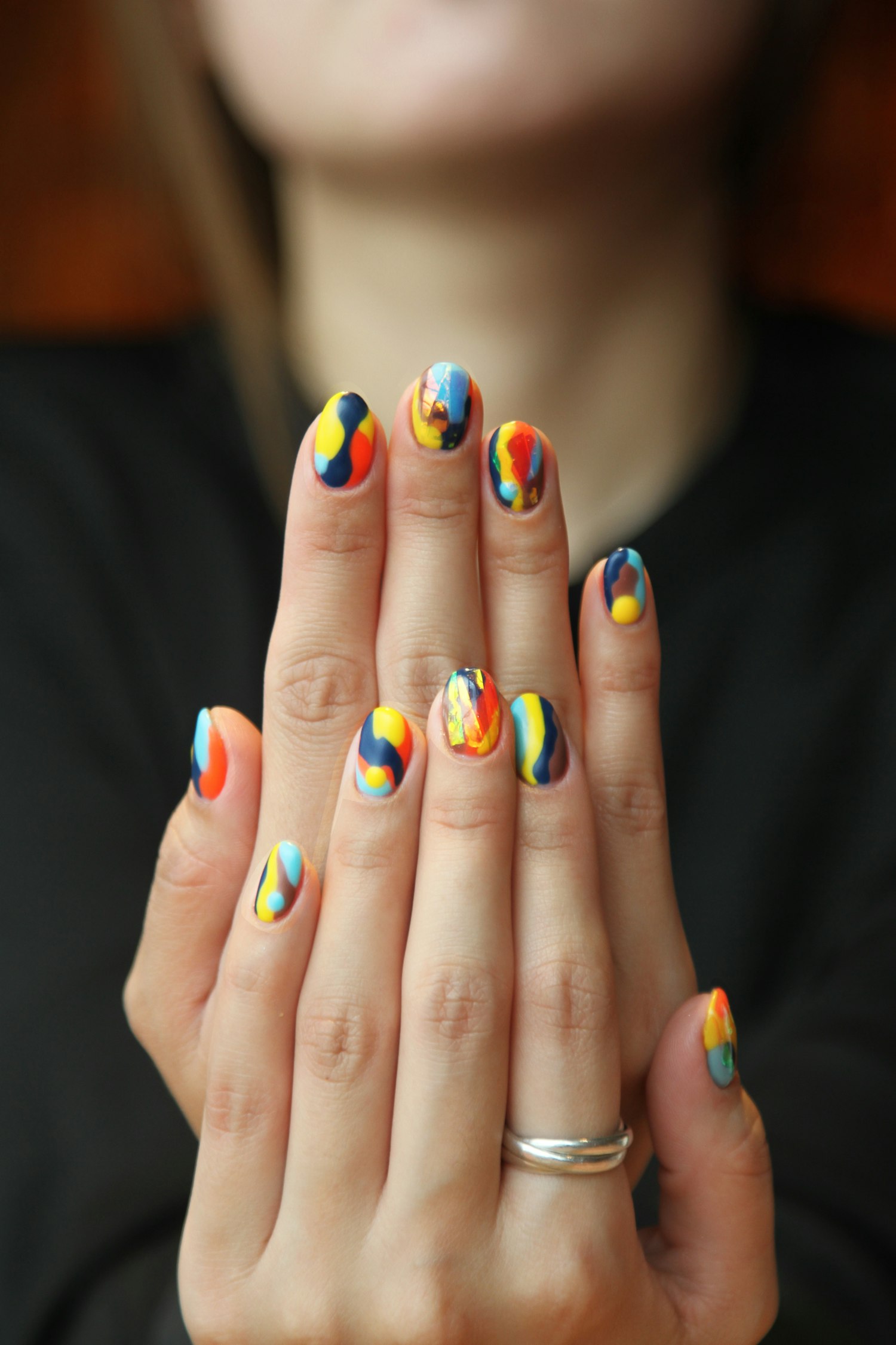Hands with rings and polished nails
